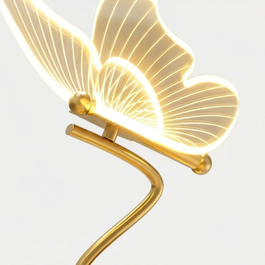 Nivesia butterfly LED decorative table lamp glowing on bedside table