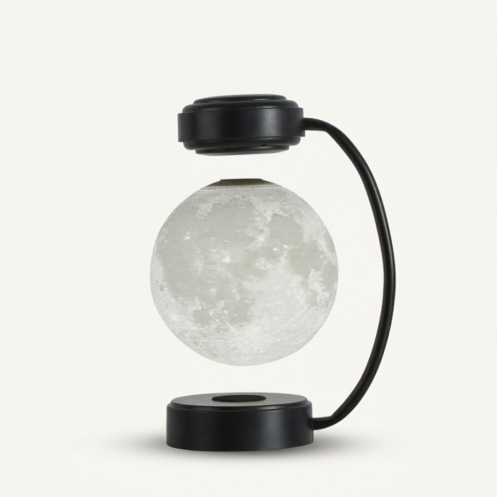 Nivesia levitating moon lamp floating above a gold base