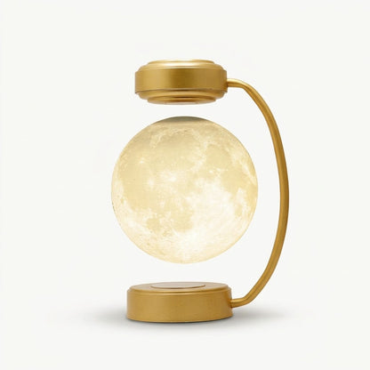 Nivesia levitating moon lamp floating above a gold base