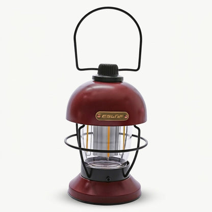 Nivesia rechargeable LED camping lantern glowing at a campsite