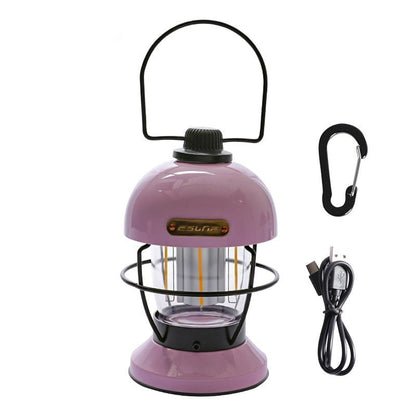 Nivesia rechargeable LED camping lantern glowing at a campsite