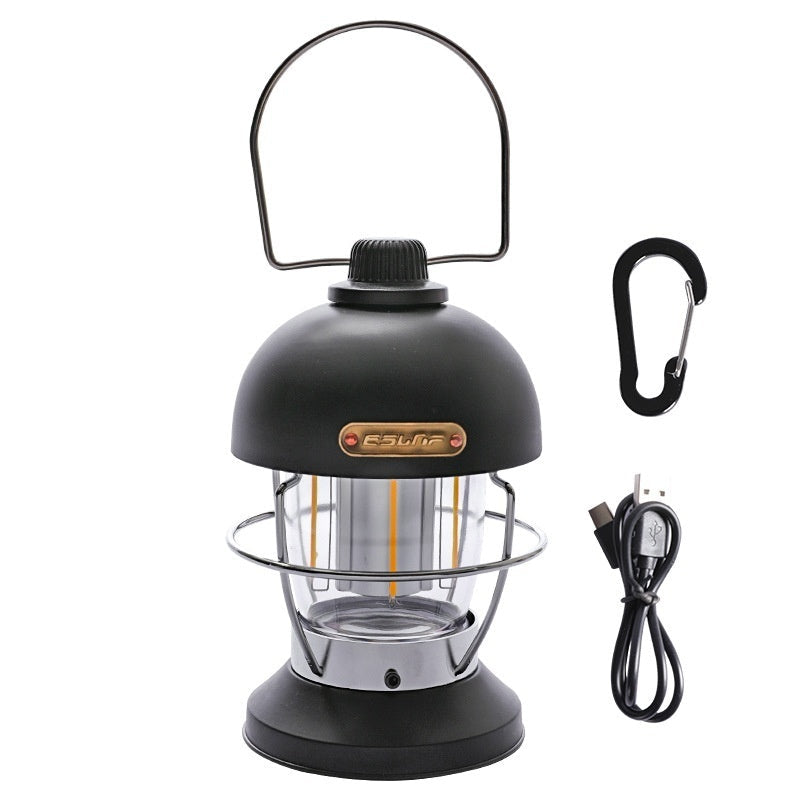 Nivesia rechargeable LED camping lantern glowing at a campsite